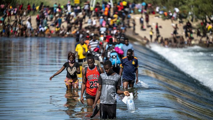 Haitians Crossing Border Mexico over water